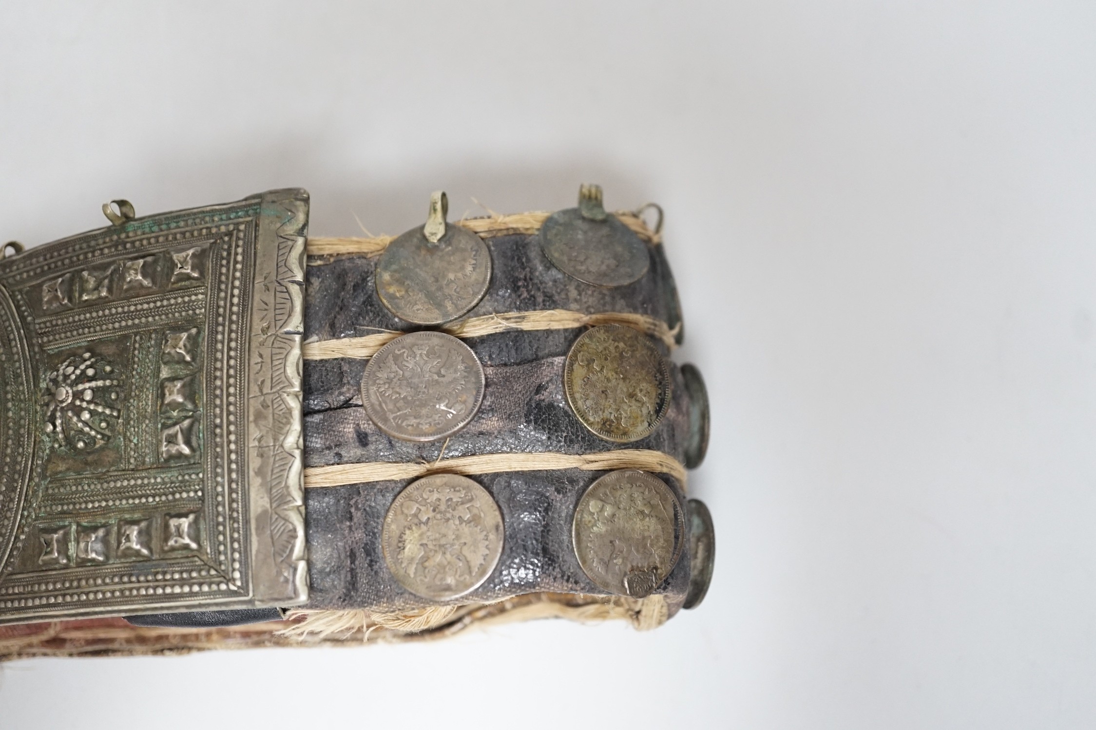 A 19th century Afghan belt, Russian coin mounted